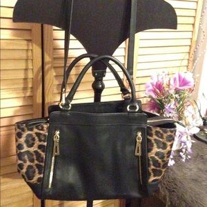 Black leopard shoulder bag with red lining